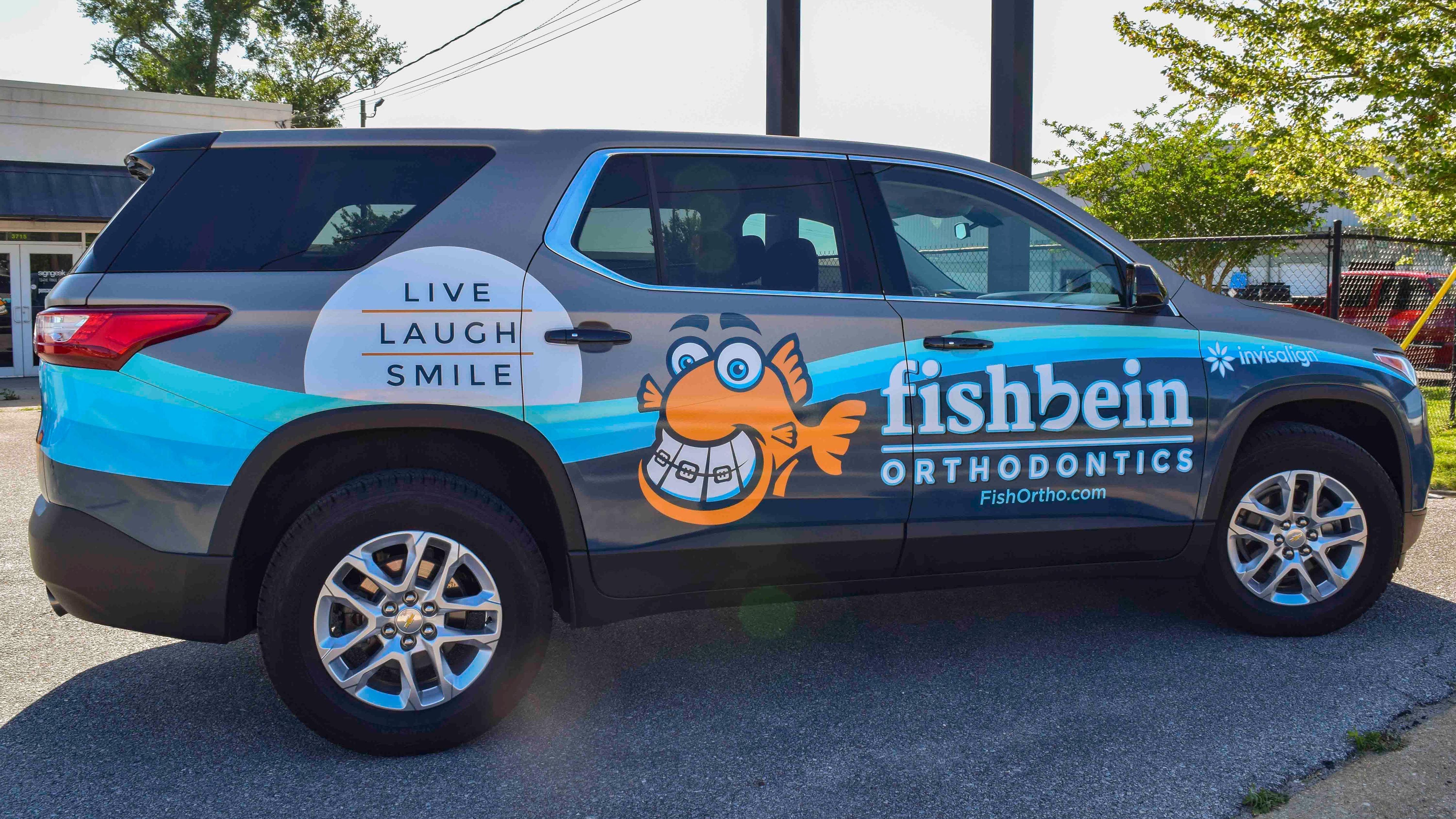 Vehicle wrap for Fishbein Orthodontics - Pensacola Sign vehicle wraps 