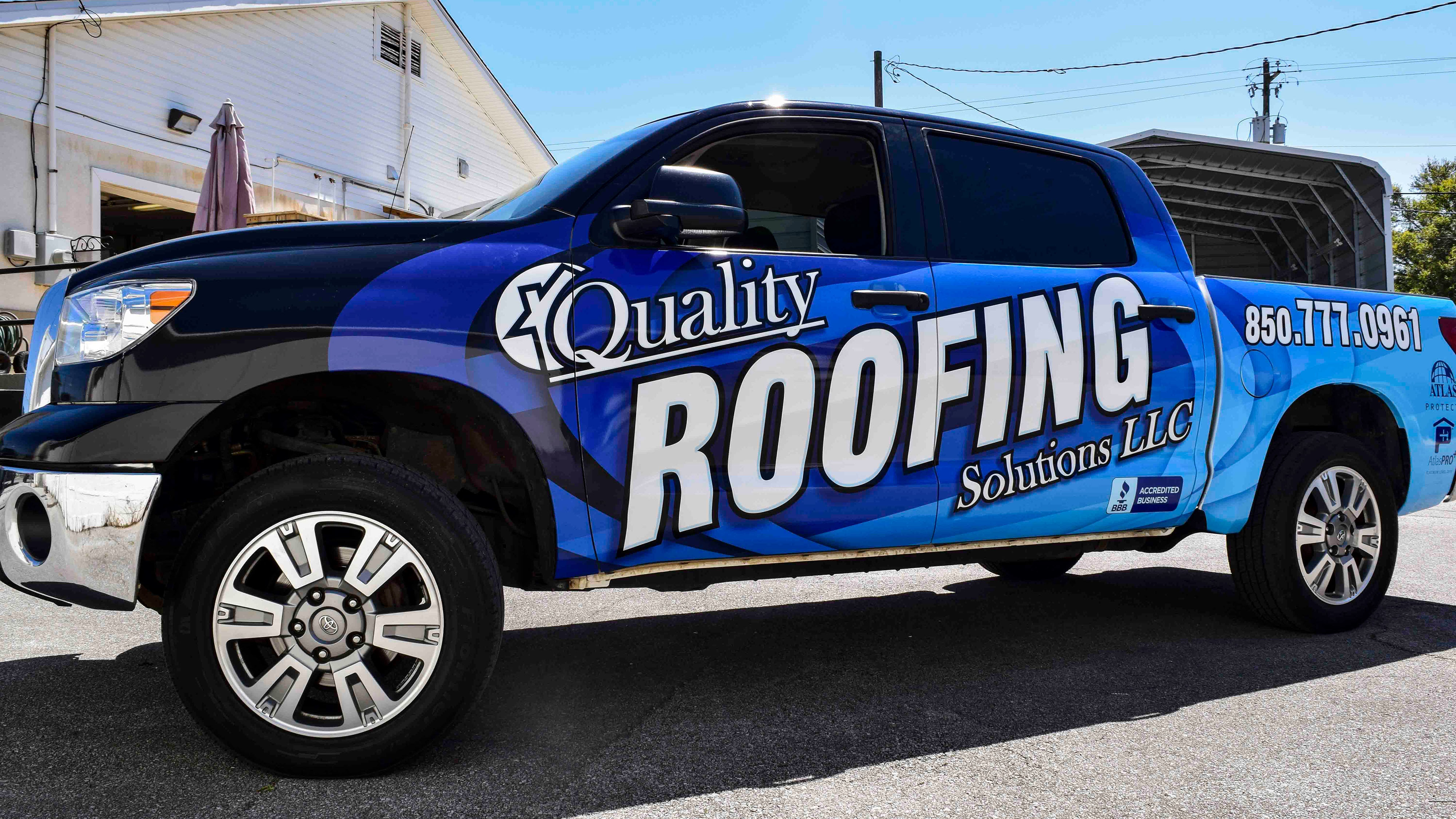 Vehicle wrap for Quality Roofing Solutions truck - Pensacola Sign Vehicle Wraps