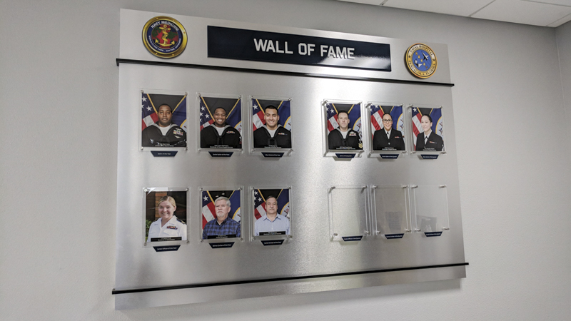 Custom built hanging hallway photo display for Naval Hospital Pensacola by Pensacola Sign