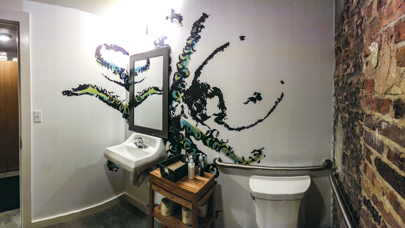 Bathroom gyotaku art wall mural for Nom Sushi Izakaya - Pensacola Sign Environmental Graphics
