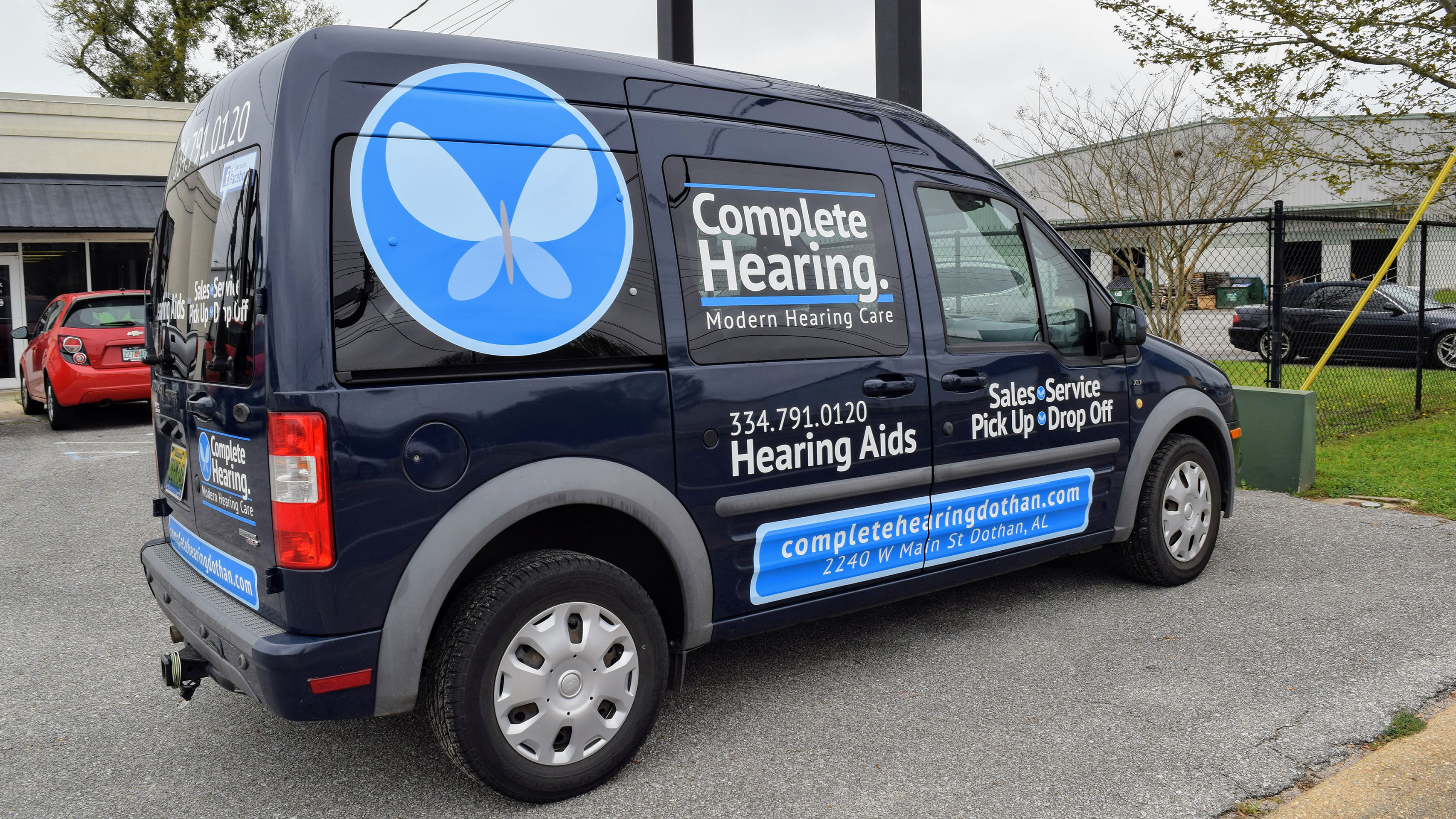 Printed graphics on Complete Hearing cargo vans - Pensacola Sign Vehicle Graphics