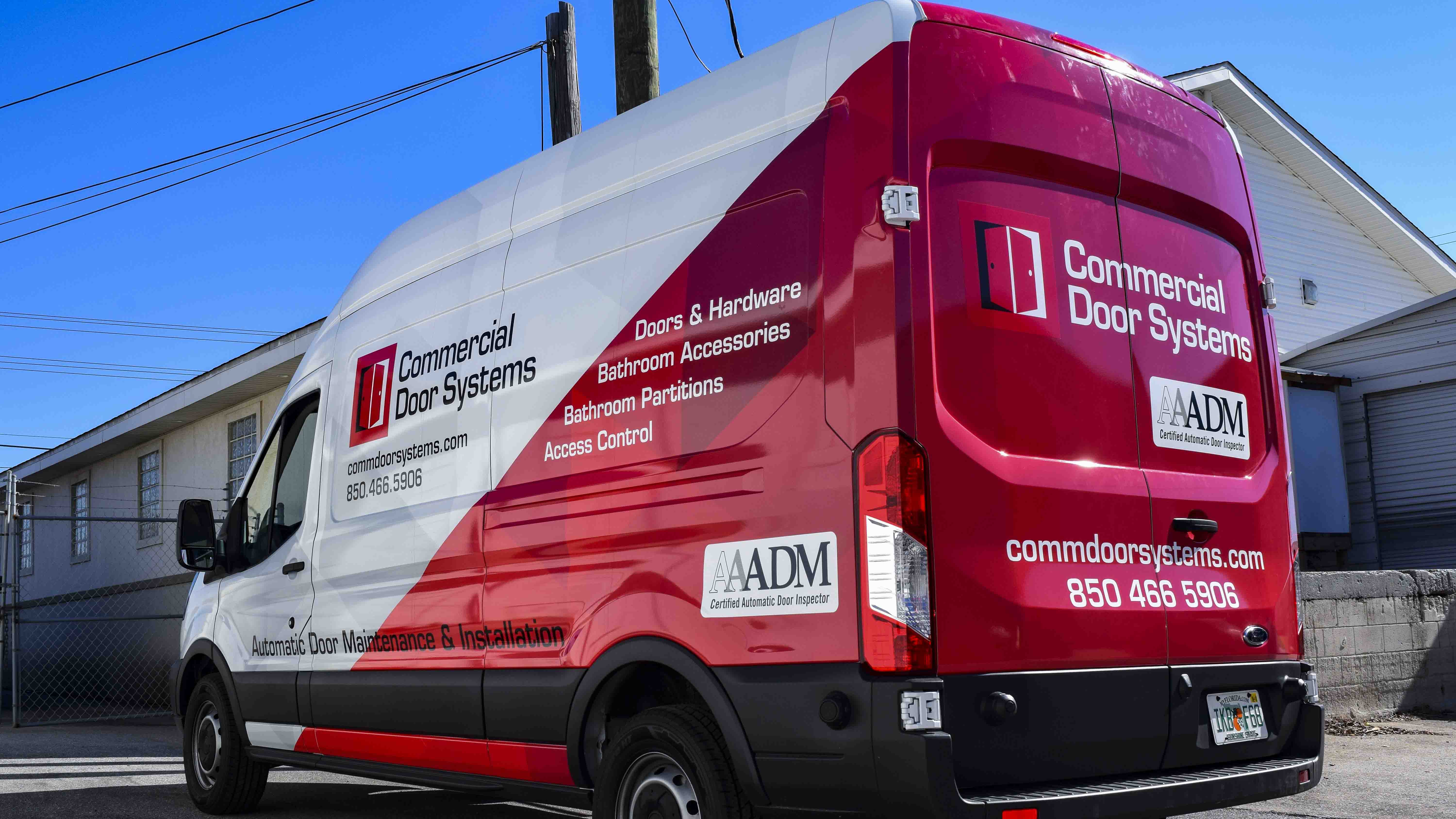 Pensacola Sign Vehicle Wraps - Cargo Van Wrap for Commercial Door Systems