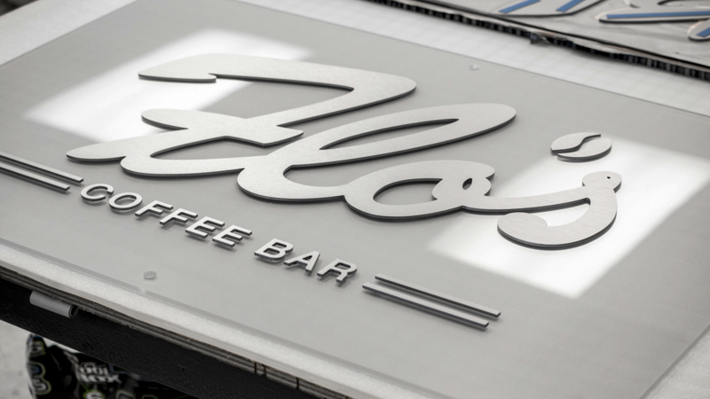 Flo's Coffee Bar interior corporate identity signage by Pensacola Sign