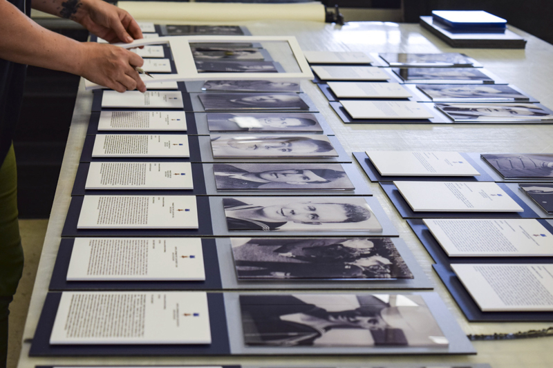 Custom built hanging hallway photo display for Naval Hospital Pensacola Medal of Honor recipients by Pensacola Sign