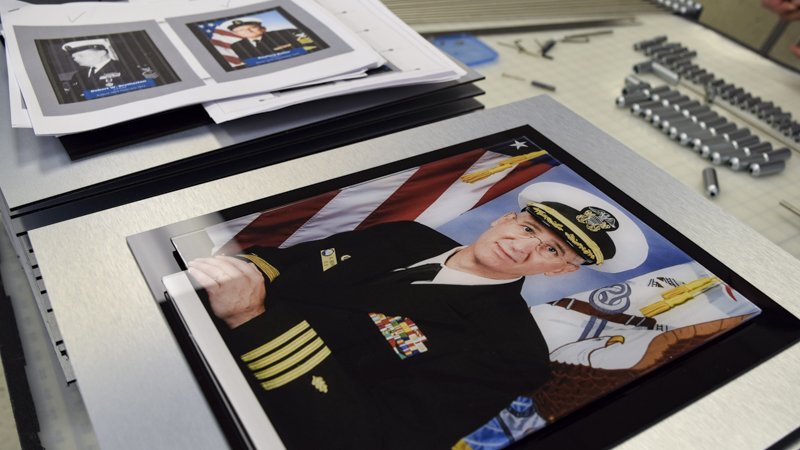 Custom built hanging hallway photo display for Naval Hospital Pensacola by Pensacola Sign