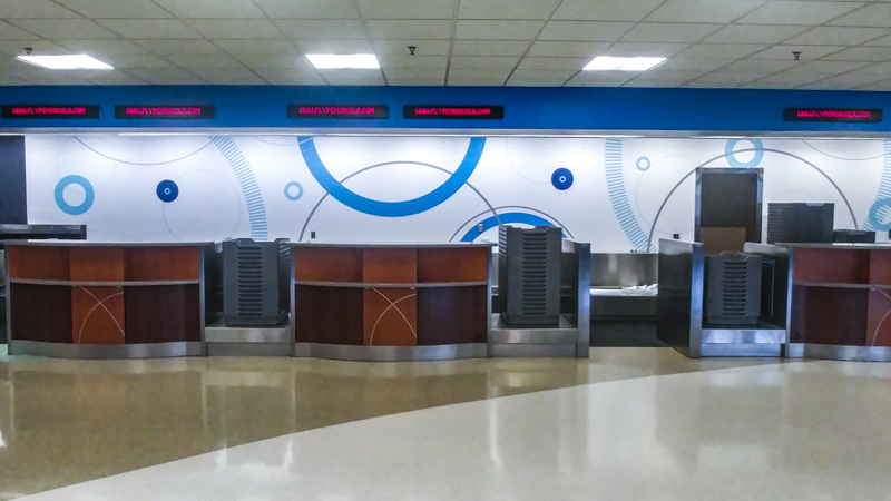 Pensacola International Airport ticket counter wall wrap - Pensacola Sign Wall Wraps