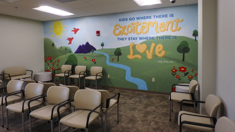 Community Health of NWF wall wraps - Pensacola Sign Environmental Graphics
