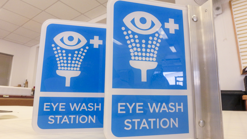 Eye wash station interior wayfinding by Pensacola Sign