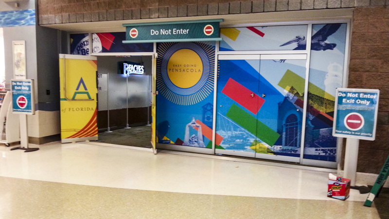 Pensacola International Airport window graphics and wayfinding by Pensacola Sign