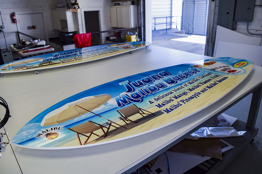 Custom Display for Malibu Rum's "Buckets of Love" Vinyl Wrapped Skimboards Point of Purchase Store Displays (POP Display) by Pensacola Sign 